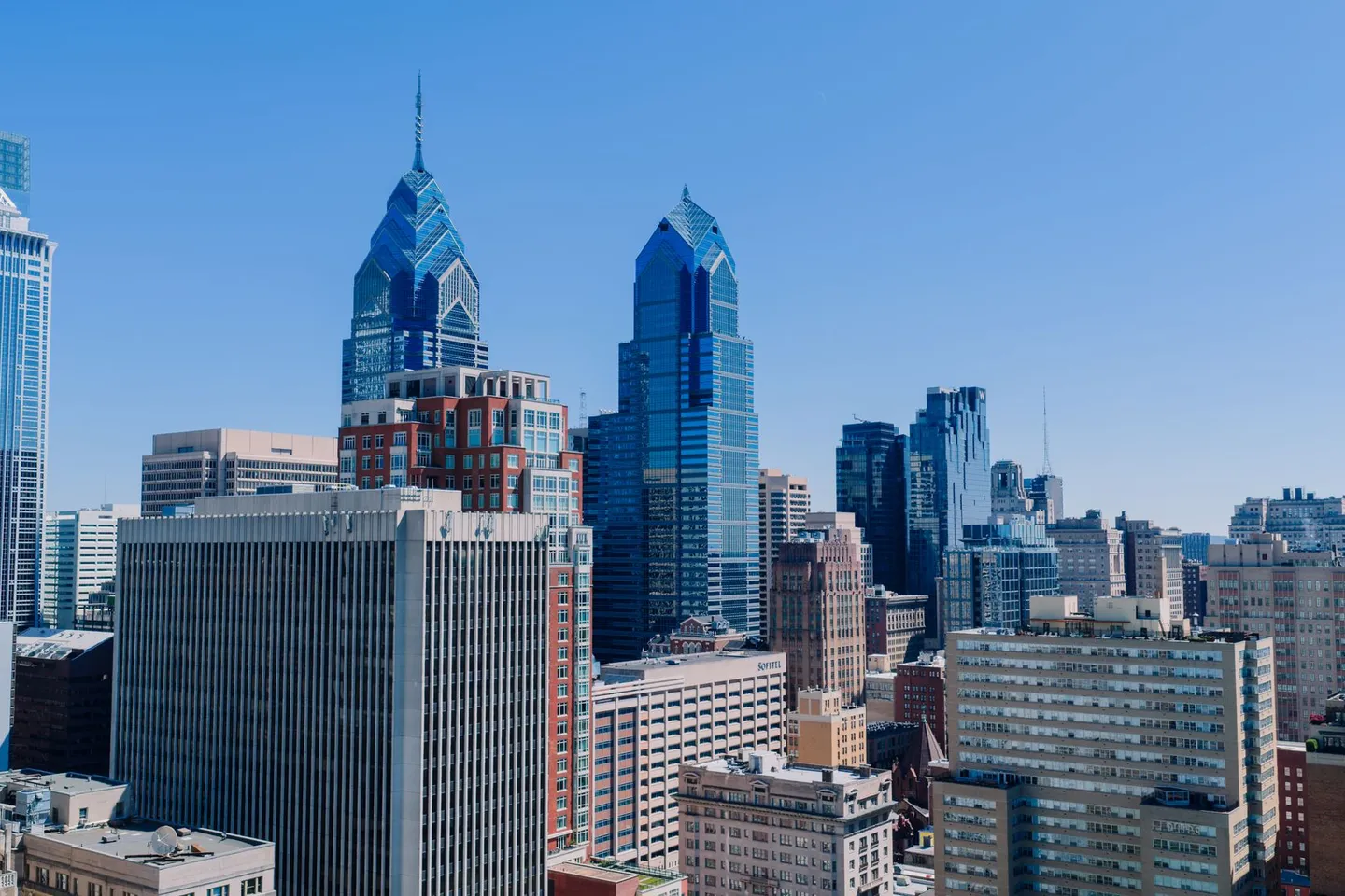 The Philadelphia skyline with its glass towers on a clear day in Pennsylvania.